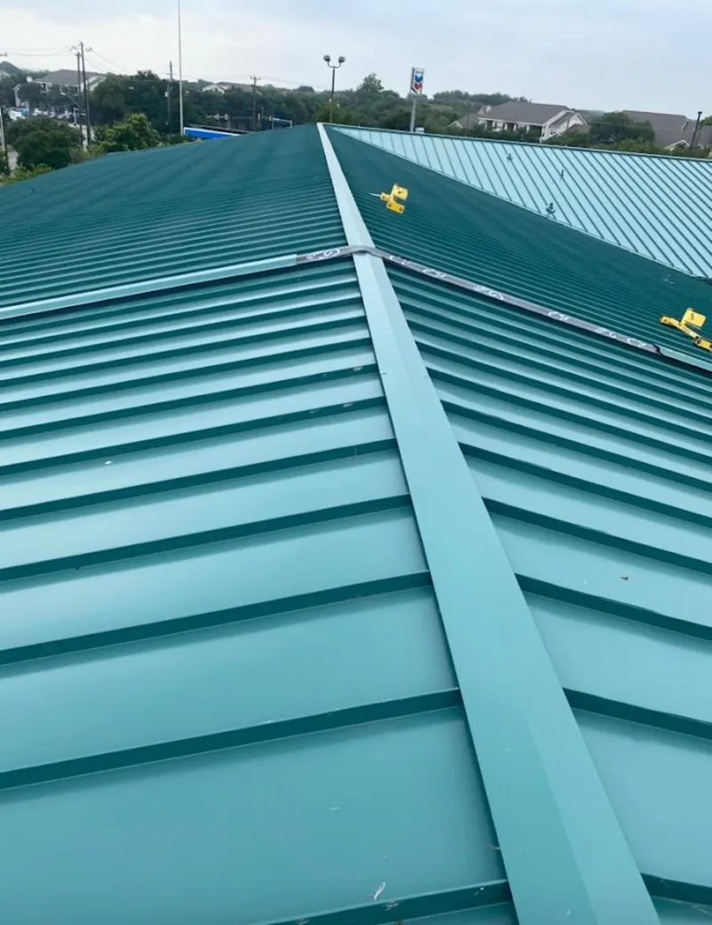 Green commercial metal roof ridge and valley for Metal Roof Repair in Arkansas City