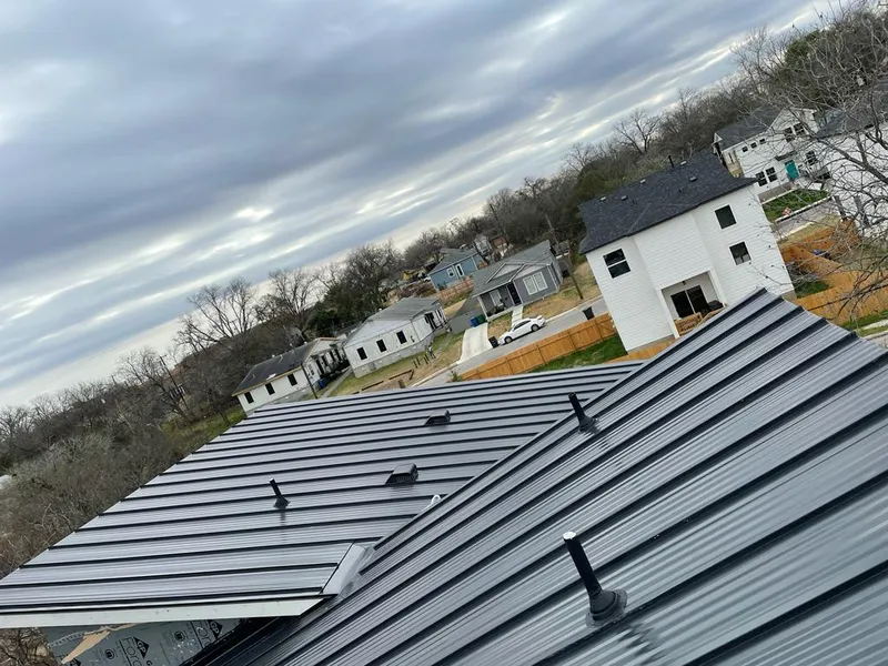 Standing seam metal roof panels with vents for Skylight Repair in Arkansas City
